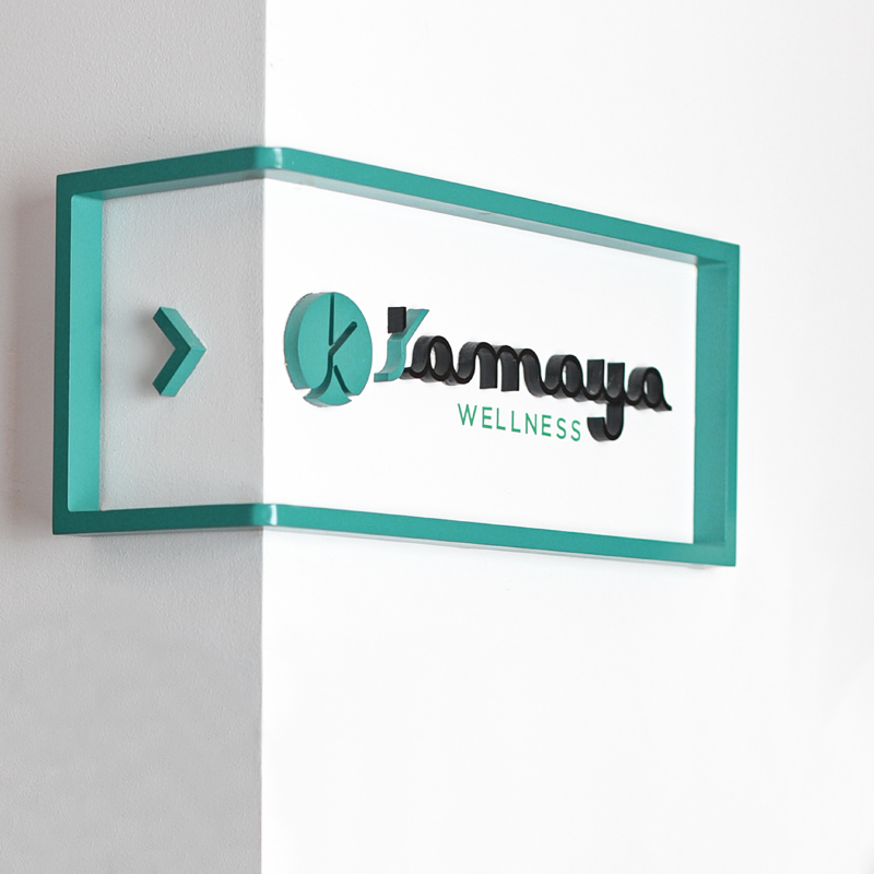 Kamaya wellness logo on wall